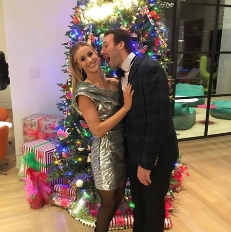 Tony Romo and Candice Crawford during the Christmas